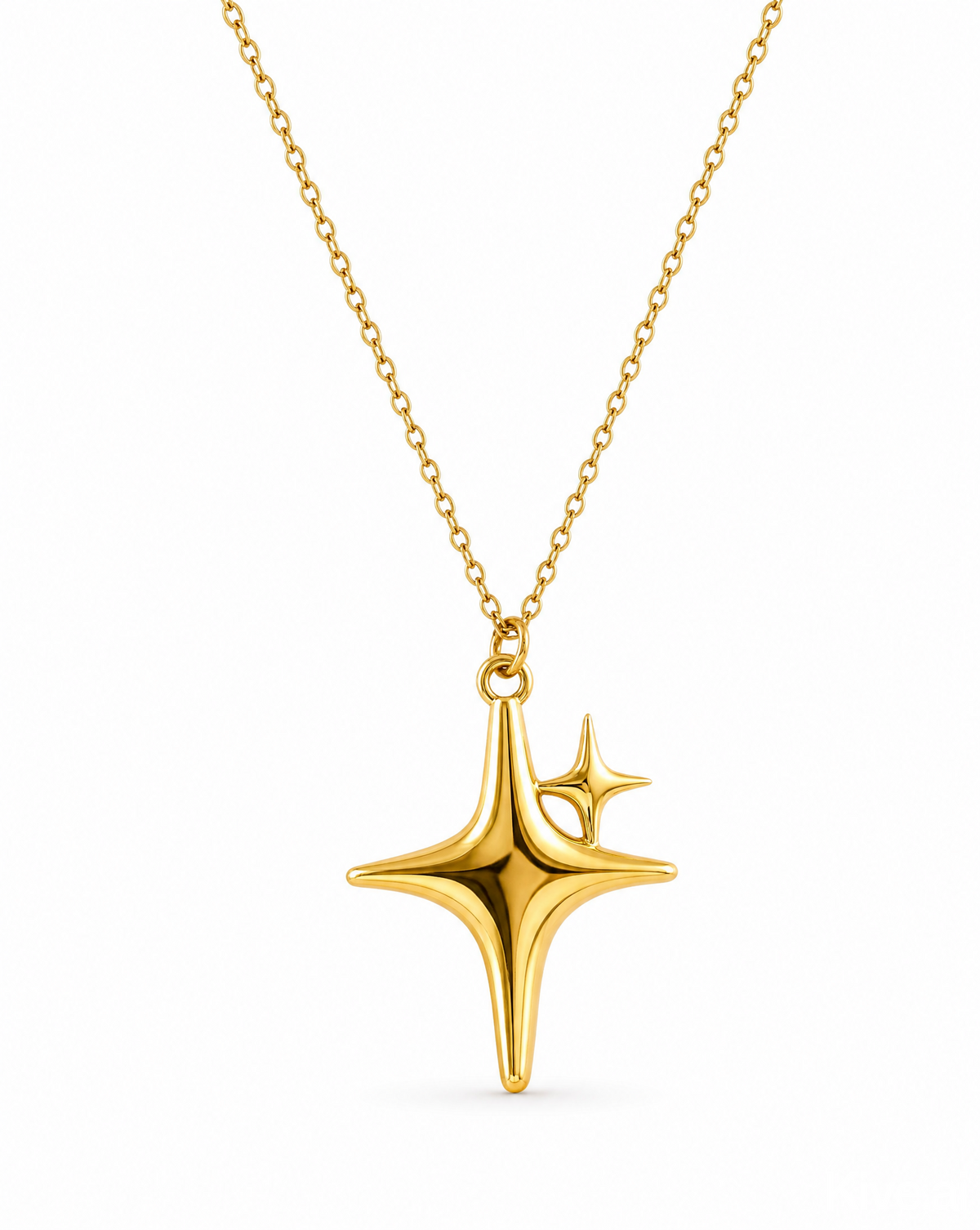Gold star necklace on a white background